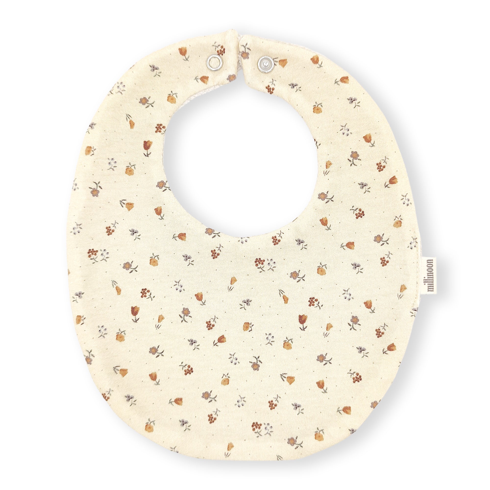 Bavoir en coton fleuri